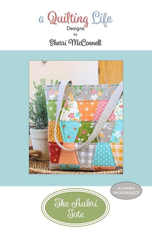 The Aubri Tote Pattern QLD 154 By Sherri McConnell For Quilting Life Designs Finished Size 12.5" x 16.5" x 3.5" Charm Pack Friendly